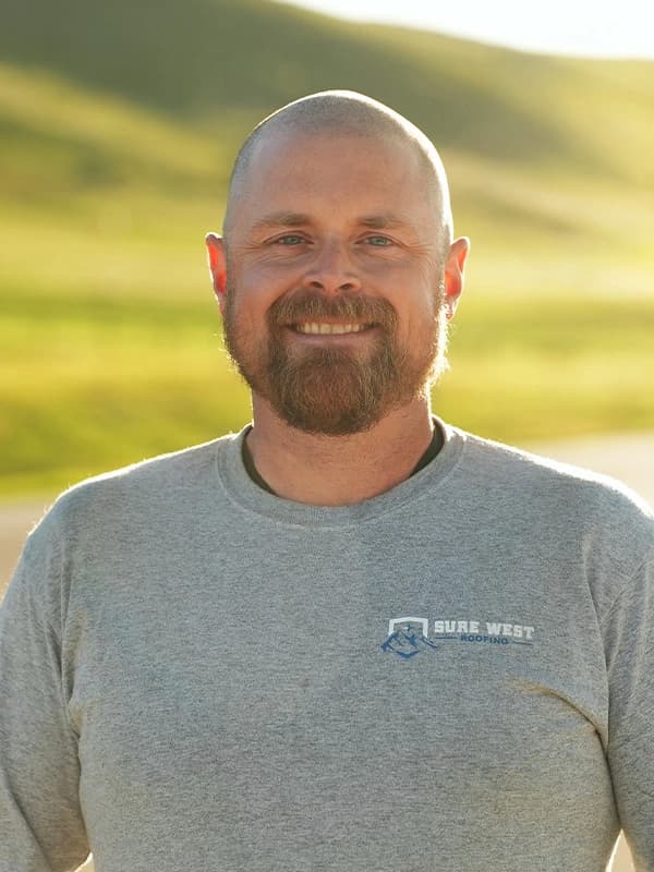 Adam, Sure West Roofing crew member in Cochrane, Alberta