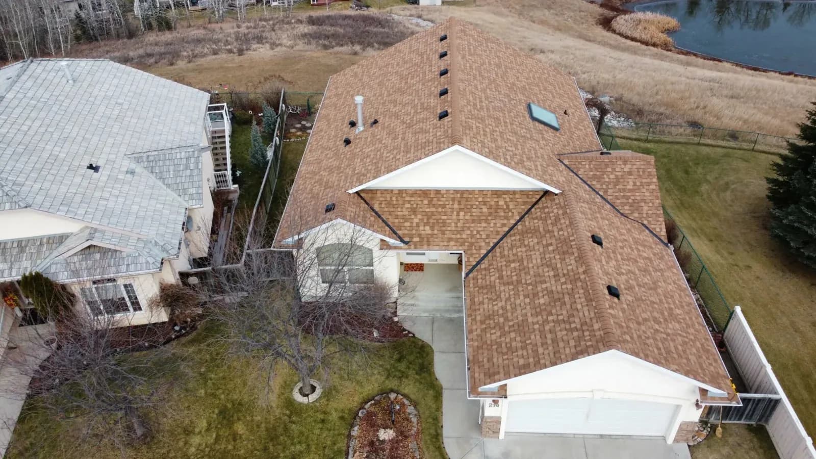 Roof replacement on a Calgary home by Sure West