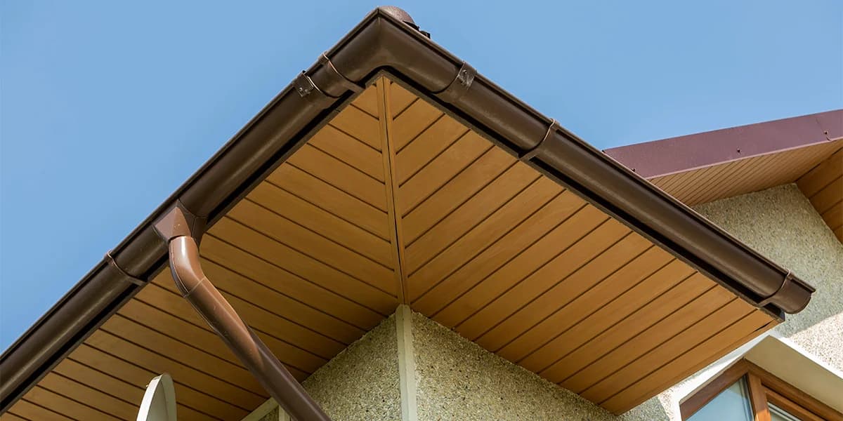 Modern black aluminum fascia and soffit detail on a Cochrane Alberta home