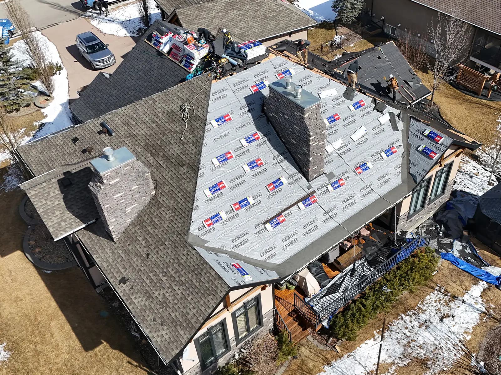 Sure West Roofing hail damage inspection and repair in Cochrane