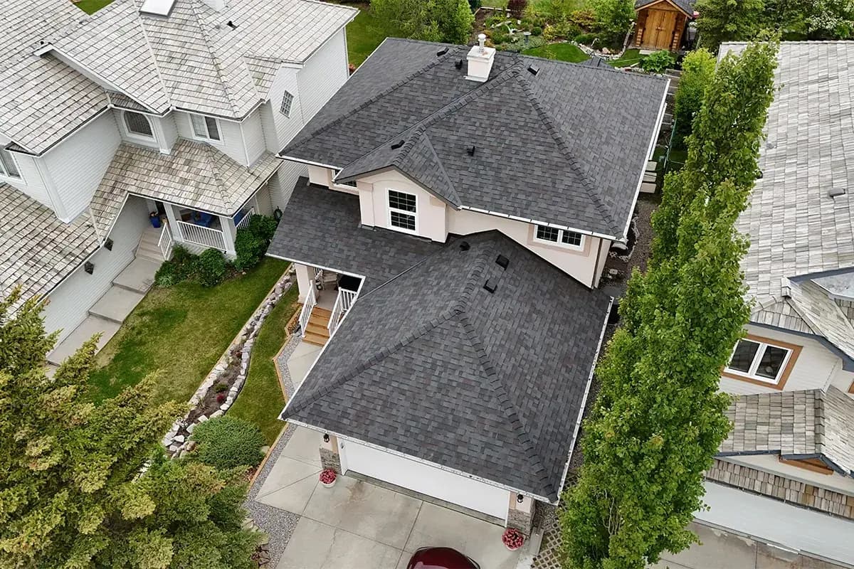 Hail damage roof repair in Cochrane Alberta by Sure West Roofing