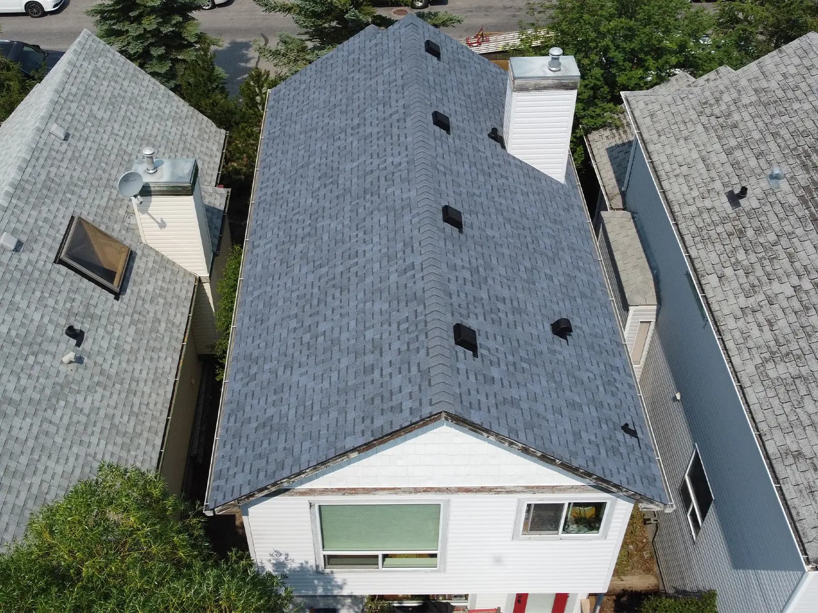 Completed roof in Canmore Alberta by Sure West Roofing