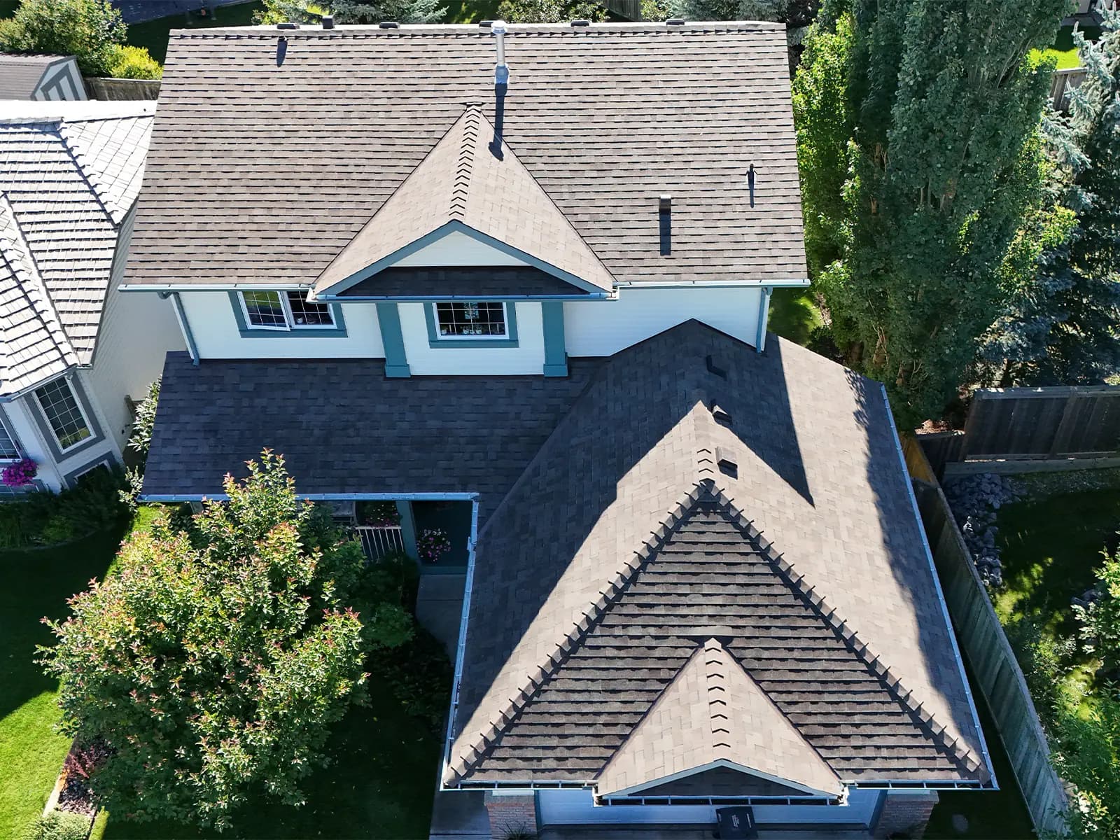 Completed roof in Cochrane Alberta by Sure West Roofing