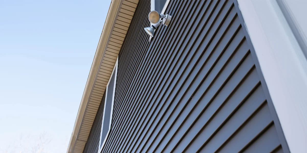 Vinyl and fibre cement siding installation in Cochrane Alberta